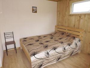 Ένα ή περισσότερα κρεβάτια σε δωμάτιο στο Kunigiškių 2