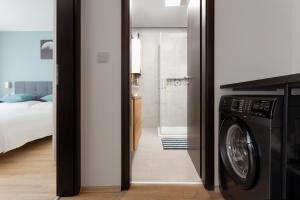 Posteľ alebo postele v izbe v ubytovaní Nádi's Apartman