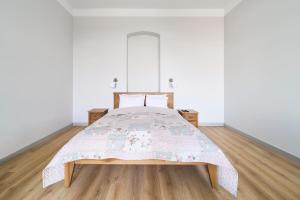 Postel nebo postele na pokoji v ubytování Lovely, Best View Apartment, Vilnius City Centre