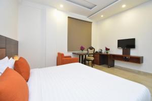 TV a/nebo společenská místnost v ubytování Hotel Bhaskar