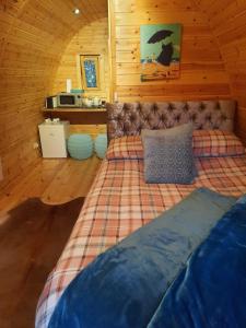 Postel nebo postele na pokoji v ubytování Log cabin
