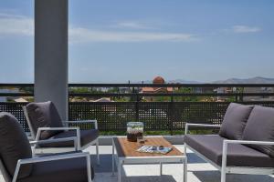 A balcony or terrace at NLH KERAMEIKOS - Neighborhood Lifestyle Hotels