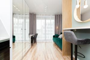 Posedenie v ubytovaní Cozy apartment Jana Kazimierza, Wola