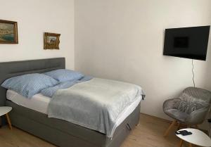 Postel nebo postele na pokoji v ubytování Ziel