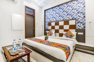 Postel nebo postele na pokoji v ubytování FabHotel Metro View + 19 fotografií