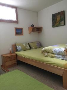 Postel nebo postele na pokoji v ubytování Töniberg Lounge