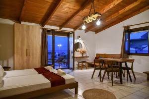 Postel nebo postele na pokoji v ubytování Iraklis Apartments
