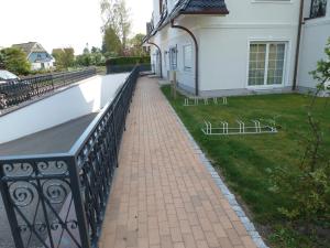 a swimming pool on a balcony of a house at Strandresidenz Deichgraf 2 Prerow in Zingst