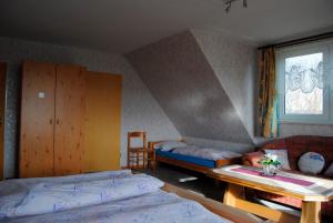 Posteľ alebo postele v izbe v ubytovaní Alte Schmiede App 4