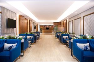 Swiss Blue Hotel Hera 레스토랑 또는 맛집