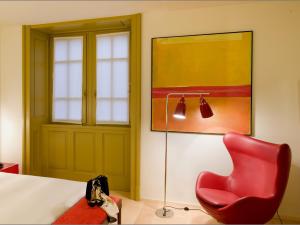 Postel nebo postele na pokoji v ubytování Petronilla - Hotel In Bergamo