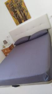 Cama o camas de una habitación en Primavera Bed and Breakfast.