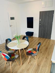 Televízia a/alebo spoločenská miestnosť v ubytovaní Apartament Walczaka 15 MIEJSCE PARKINGOWE