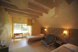 Postel nebo postele na pokoji v ubytování Altmõisa Guesthouse + 25 fotografií