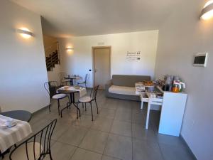 Postel nebo postele na pokoji v ubytování BELLA ASSISI B & B