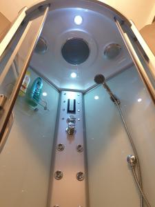 a view of a shower in a room at La Foresteria del Passeggere in Ovada +27 photos