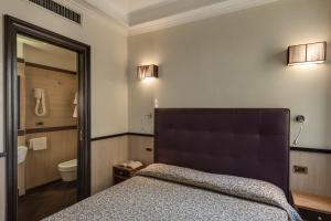 Koupelna v ubytování Hotel Borromeo