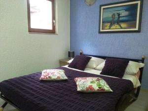 Postel nebo postele na pokoji v ubytování Apartments Sunny Split