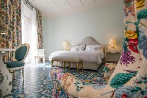 Postel nebo postele na pokoji v ubytování Hotel Cappuccino - Palma
