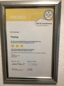 a framed diploma in a metal frame at Thesing RE22 in Sögel