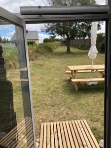 Zahrada ubytování Maisonnette à 100 m de la plage + 4 fotografie