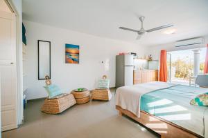Postel nebo postele na pokoji v ubytování Kas Amigu accomodations + 37 fotografií