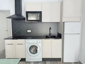 Kuchyň nebo kuchyňský kout v ubytování Modernos Apartamentos en Ciudad Jardín Córdoba