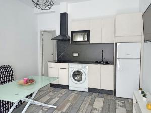 Kuchyň nebo kuchyňský kout v ubytování Modernos Apartamentos en Ciudad Jardín Córdoba