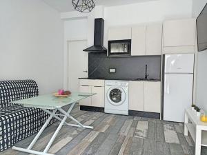 Kuchyň nebo kuchyňský kout v ubytování Modernos Apartamentos en Ciudad Jardín Córdoba