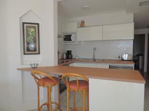 Kuchyň nebo kuchyňský kout v ubytování Apartment-Hotel Altamira