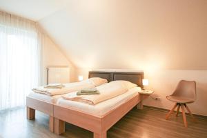 Familienhof Brüning - Stadtblick房間的床