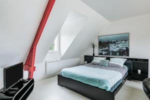 Katil atau katil-katil dalam bilik di Le Galop