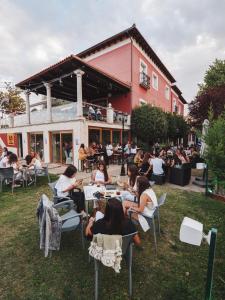 Un restaurant u otro lugar para comer en Hotel Doña Carmen