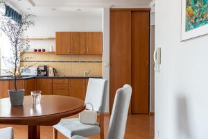 Kuchnia lub aneks kuchenny w obiekcie Prestige Apartament Przy Nosalu