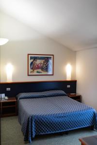 Posteľ alebo postele v izbe v ubytovaní Hotel Crystal