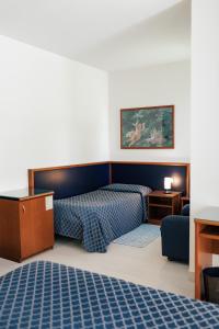 Posteľ alebo postele v izbe v ubytovaní Hotel Crystal