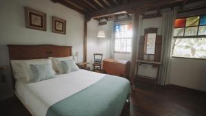 Postel nebo postele na pokoji v ubytování Casa La Monja