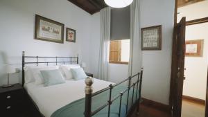 Postel nebo postele na pokoji v ubytování Casa La Monja