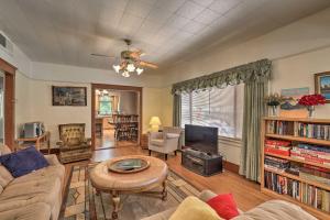 a living room with a couch and a table at Bisbee Home Less Than half Mi to Park and Tennis Courts! in Bisbee