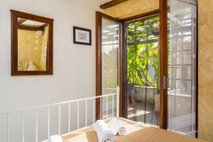 Giường trong phòng chung tại Holiday House - Old Olive +29 ảnh