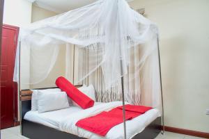 Łóżko lub łóżka w pokoju w obiekcie Kasha Premier Lodges - Area 1 Falls
