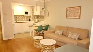 Kuchyňa alebo kuchynka v ubytovaní Sevilla Alameda PG Apartamentos