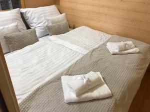 Posteľ alebo postele v izbe v ubytovaní Prána Apartman