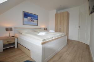 Ένα ή περισσότερα κρεβάτια σε δωμάτιο στο Stadthaus 3, inkl 1 Parkplatz
