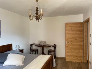 A bed or beds in a room at Casa Paolina - CIPAT 57814