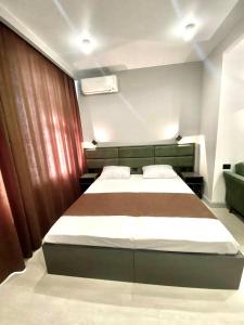 Postel nebo postele na pokoji v ubytování Апарт-отель Nine Rooms + 37 fotografií