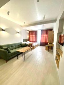 Posezení v ubytování Апарт-отель Nine Rooms