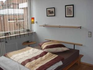 Postel nebo postele na pokoji v ubytování Blütenzauber Apartment No 2