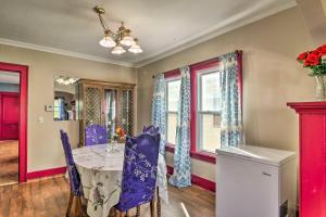 a dining room with a table and purple chairs at Riverside Buffalo Apt 15 Miles to Niagara Falls! in Buffalo +16 photos