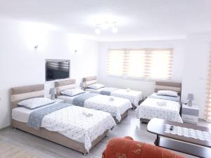 Ліжко або ліжка в номері Guest House Ahmo Halilcevic